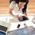 Businesswoman at her desk using a digital tablet